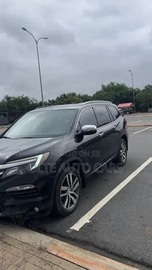 Honda Pilot Touring 4dr SUV 4WD (3.5L 6cyl 9A) 2017 Black