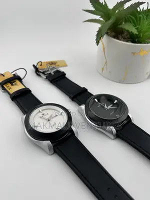 Delux Men and Ladies Leather Watches