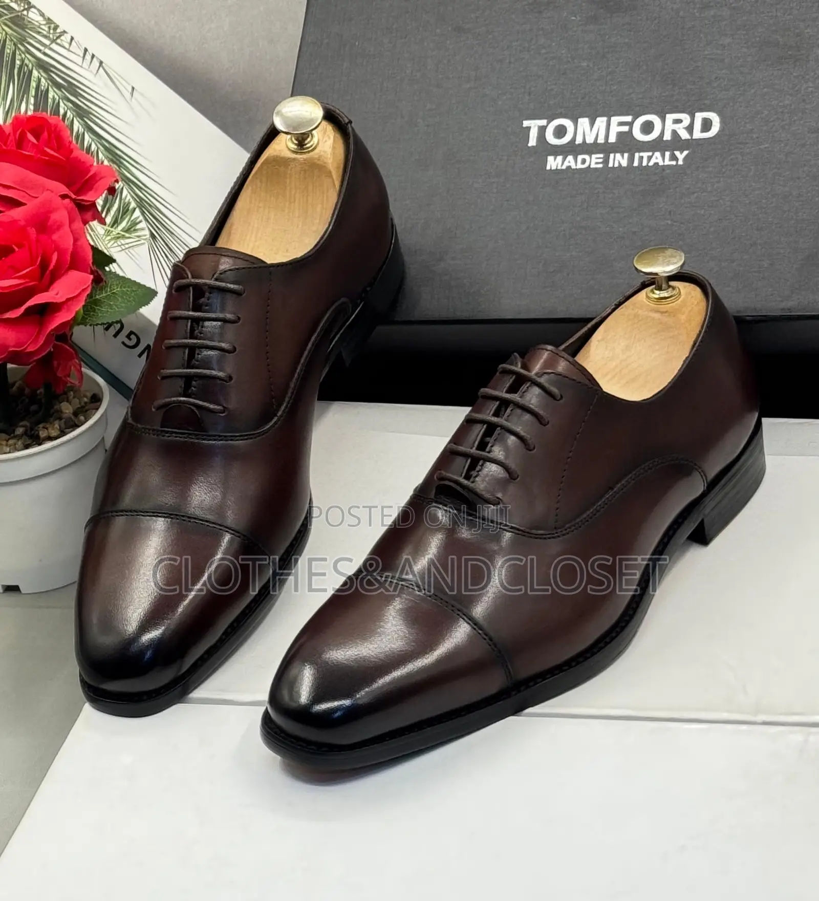 Brown Cap-Toe Oxford Shoes Feature a Polished Leather