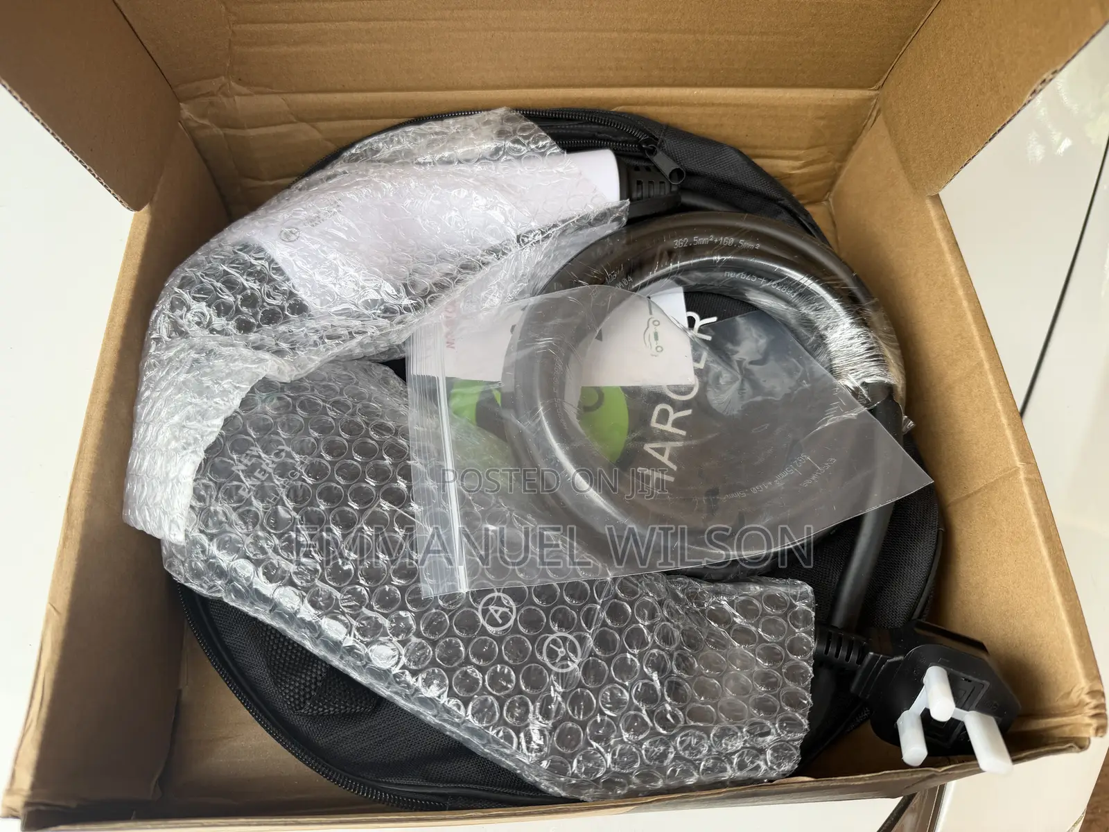 Electric Vehicle Travel Charger