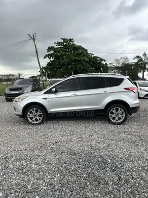 Ford Escape Titanium 4dr SUV AWD (1.6L 4cyl Turbo 6A) 2015 Gray