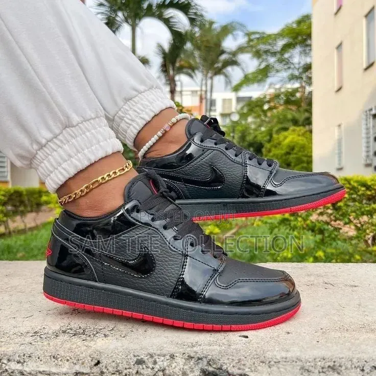 Original Jordan 1 Low Dunk. In Black With Red Sole All Black.