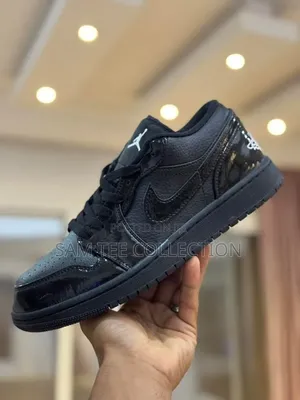 Original Jordan 1 Low Dunk. In Black With Red Sole All Black.