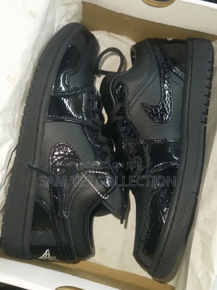 Original Jordan 1 Low Dunk. In Black With Red Sole All Black.