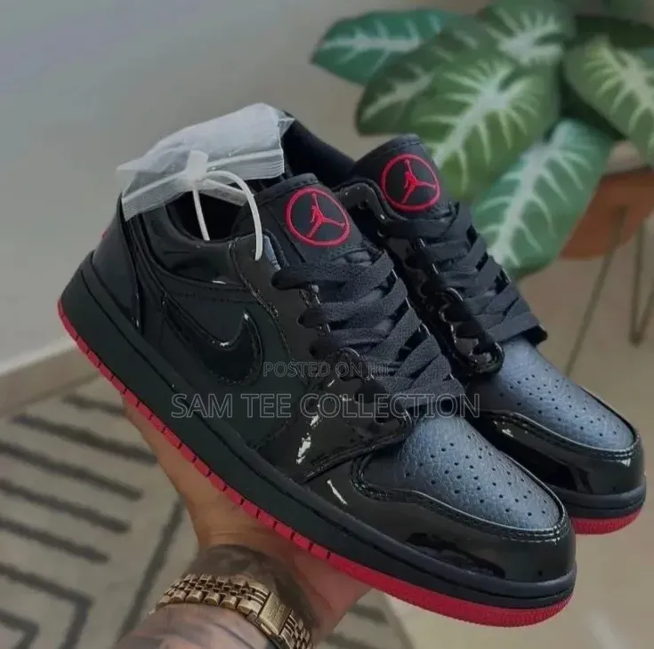 Original Jordan 1 Low Dunk. In Black With Red Sole All Black.