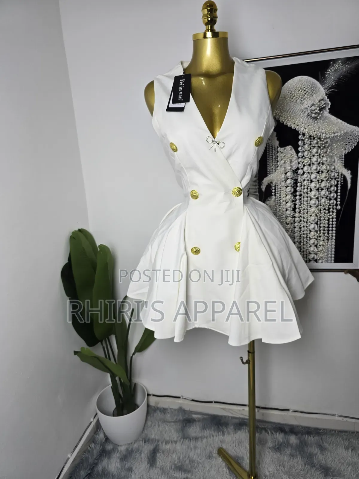Step Into Elegance With This Chic White Blazer Inspired Mini Dress