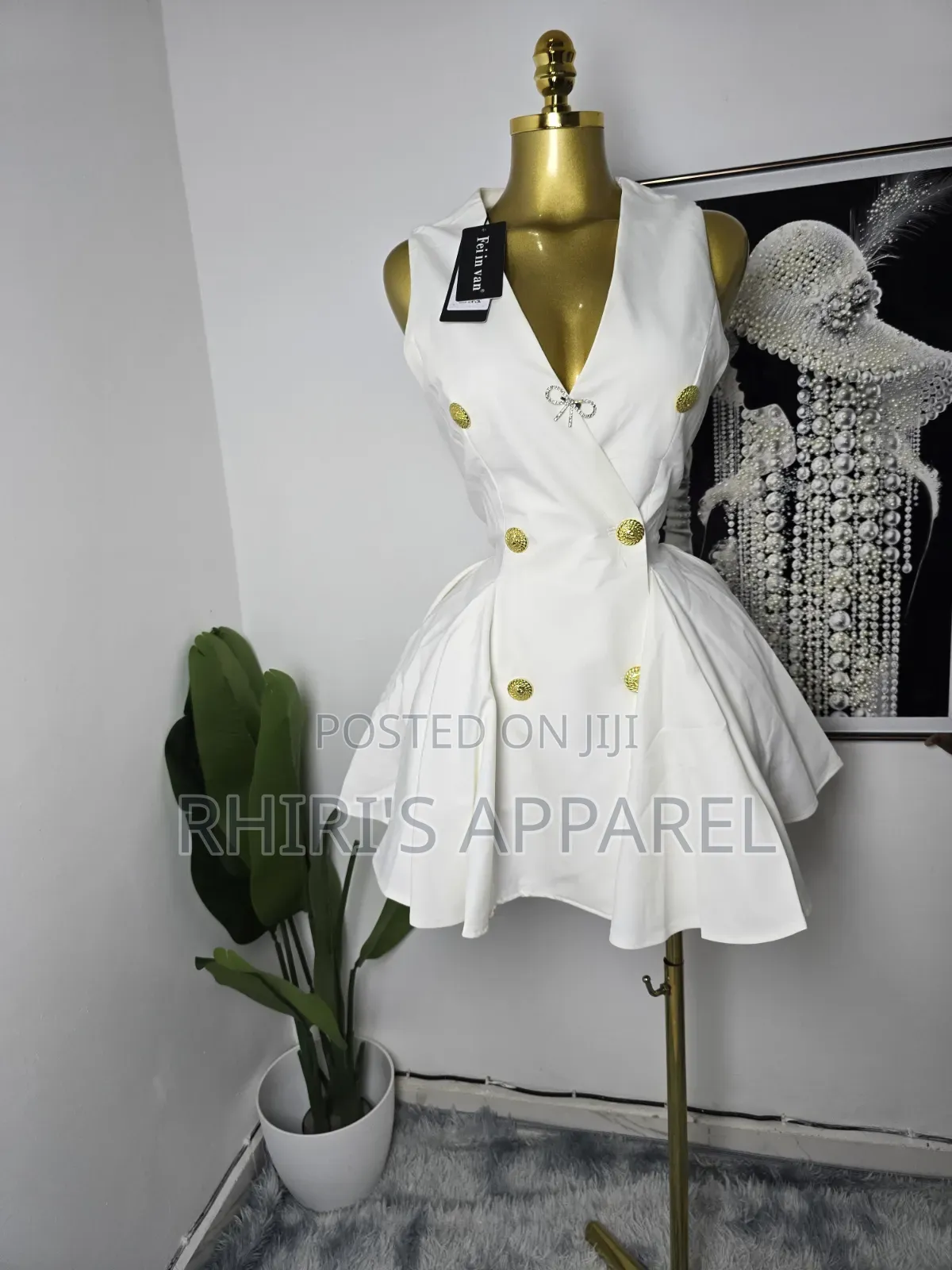 Step Into Elegance With This Chic White Blazer Inspired Mini Dress