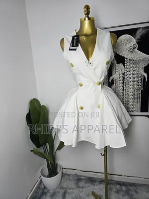 Step Into Elegance With This Chic White Blazer Inspired Mini Dress