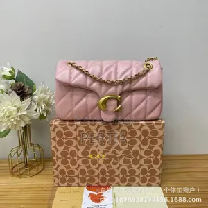 Coach Handbag With a Long Strip