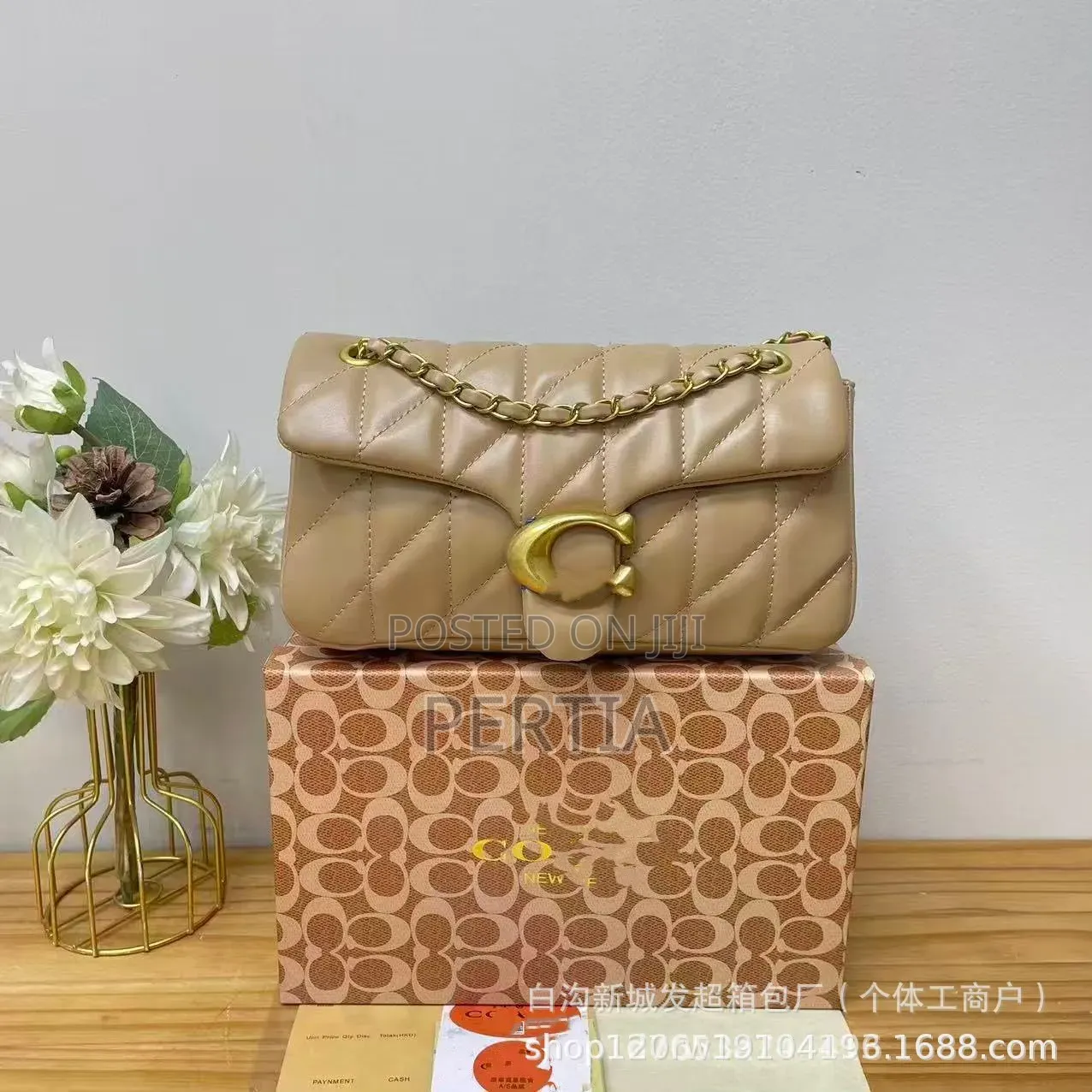 Coach Handbag With a Long Strip