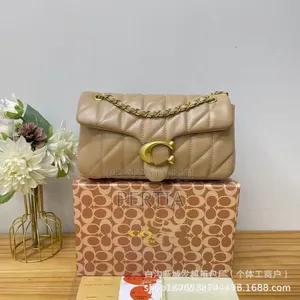 Coach Handbag With a Long Strip