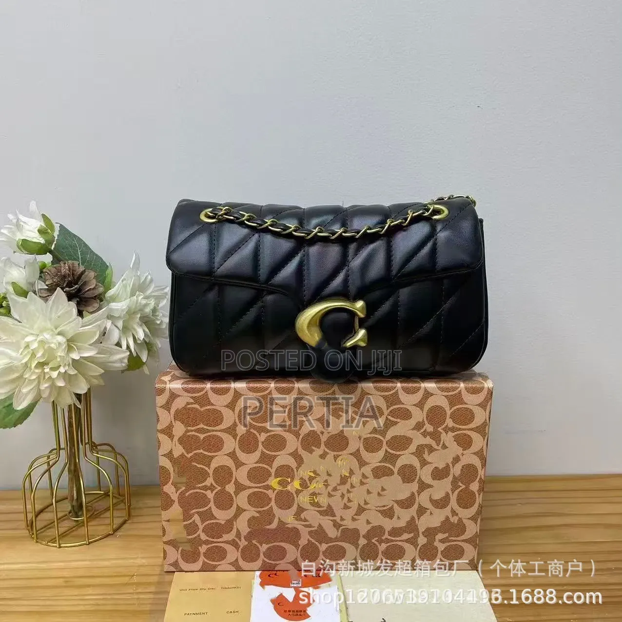 Coach Handbag With a Long Strip