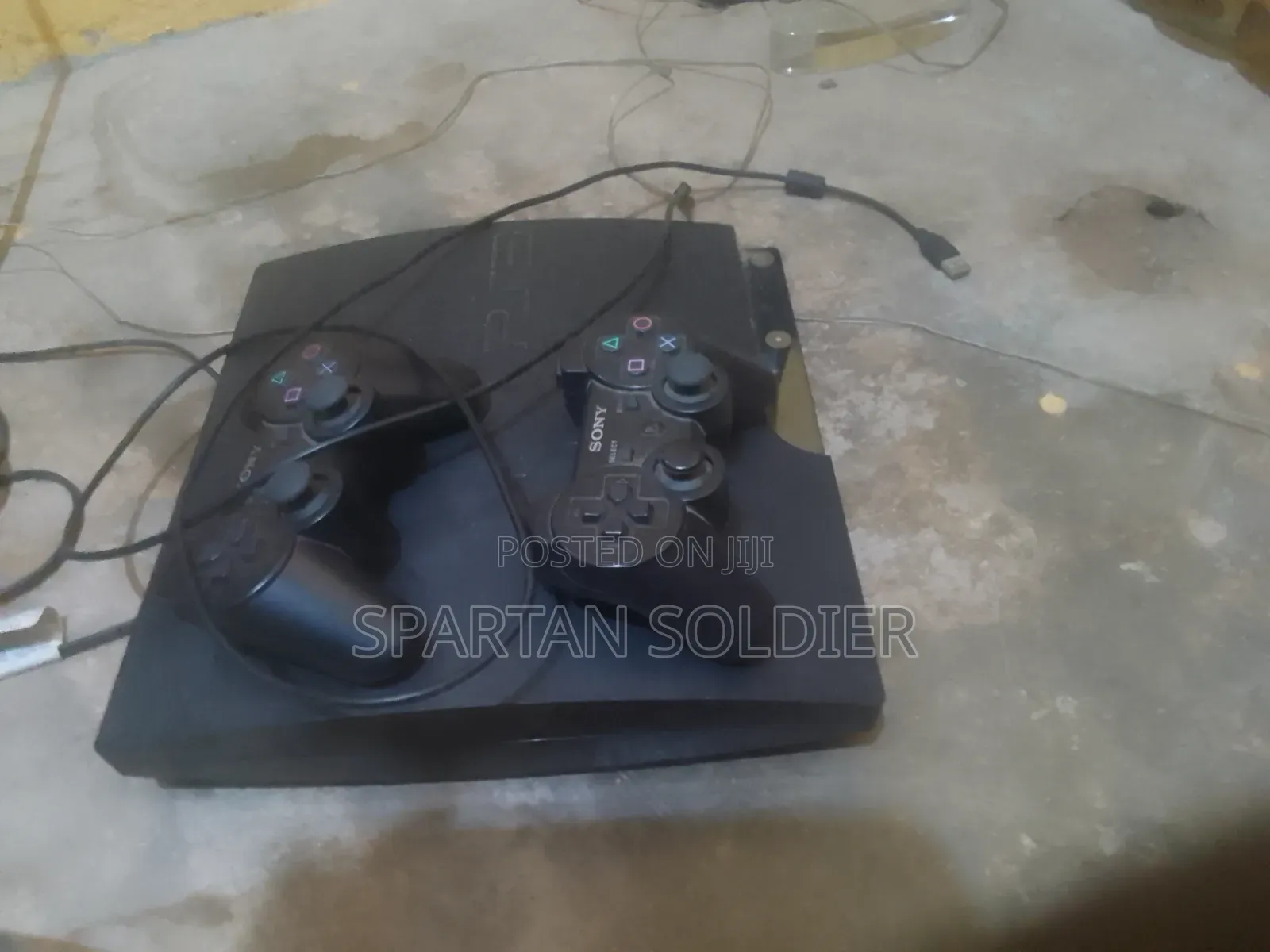 Ps3 Slim With 2 Controllers and 10 Games