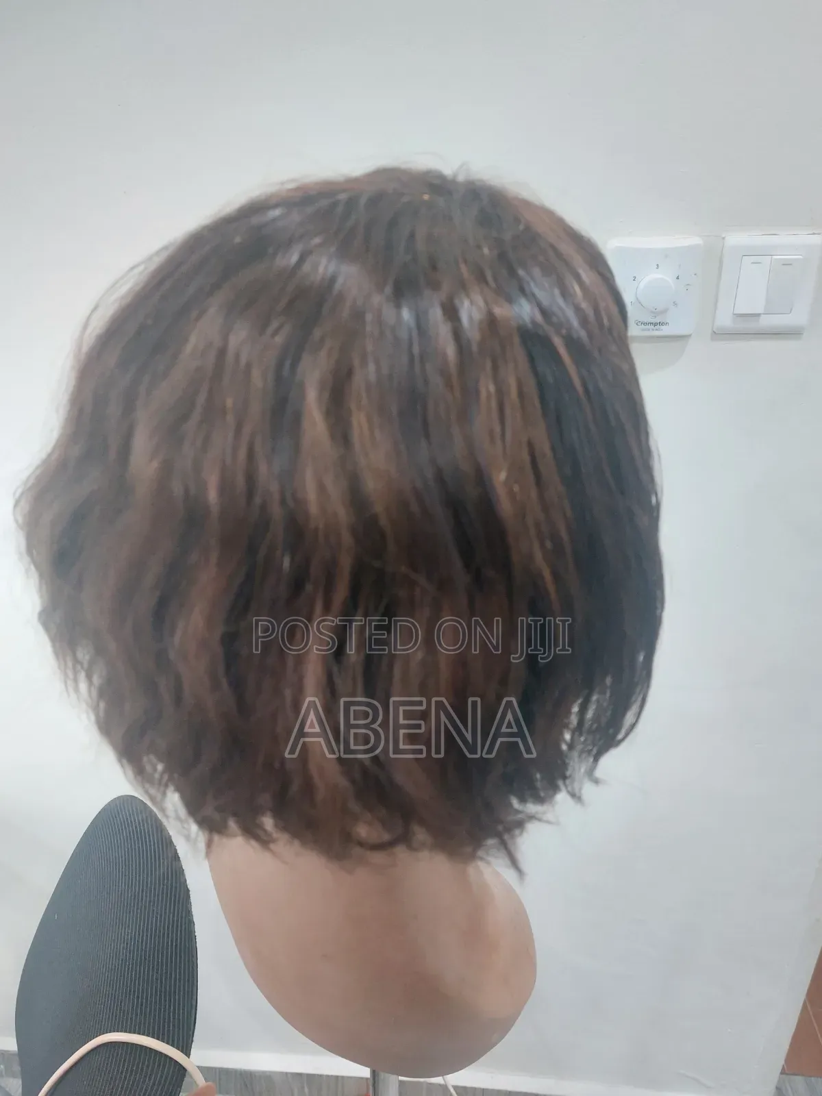 Short, Brown Human Hair Pixie Cut Wig Featuring Highlighted Strands.