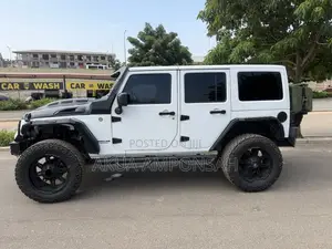 Jeep Wrangler Unlimited Sahara 4dr SUV 4WD (3.6L 6cyl 6M) 2015 White