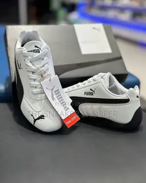 Puma Speed Cat Black and White Sneakers