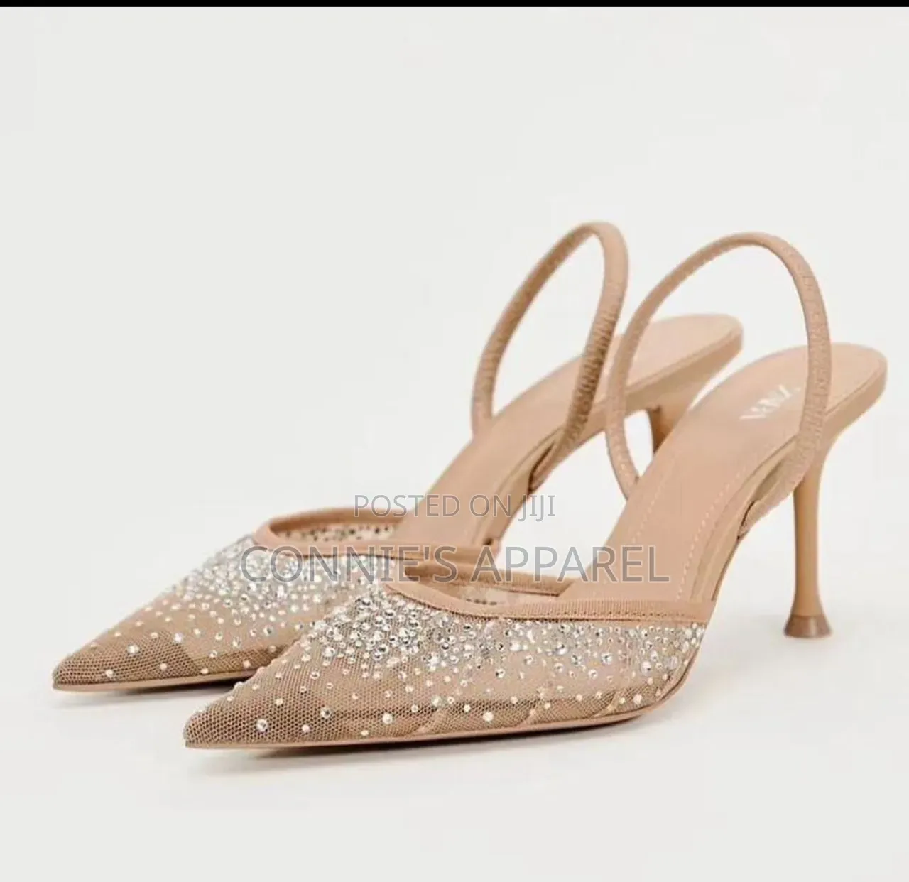 Gold Stiletto Slingback Heels With a Pointed Toe and Textured Finish
