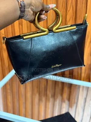 Luxury Handbags With Gold-Tone Circular Handles