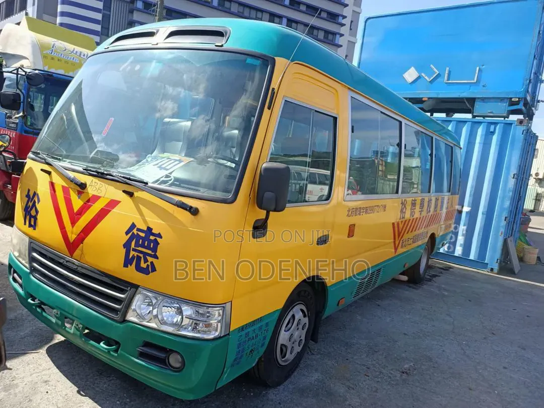 Toyota Coaster 2012 Yellow
