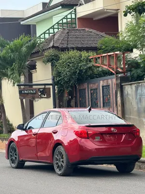 Toyota Corolla XLE (1.8L 4cyl 2A) 2019 Red