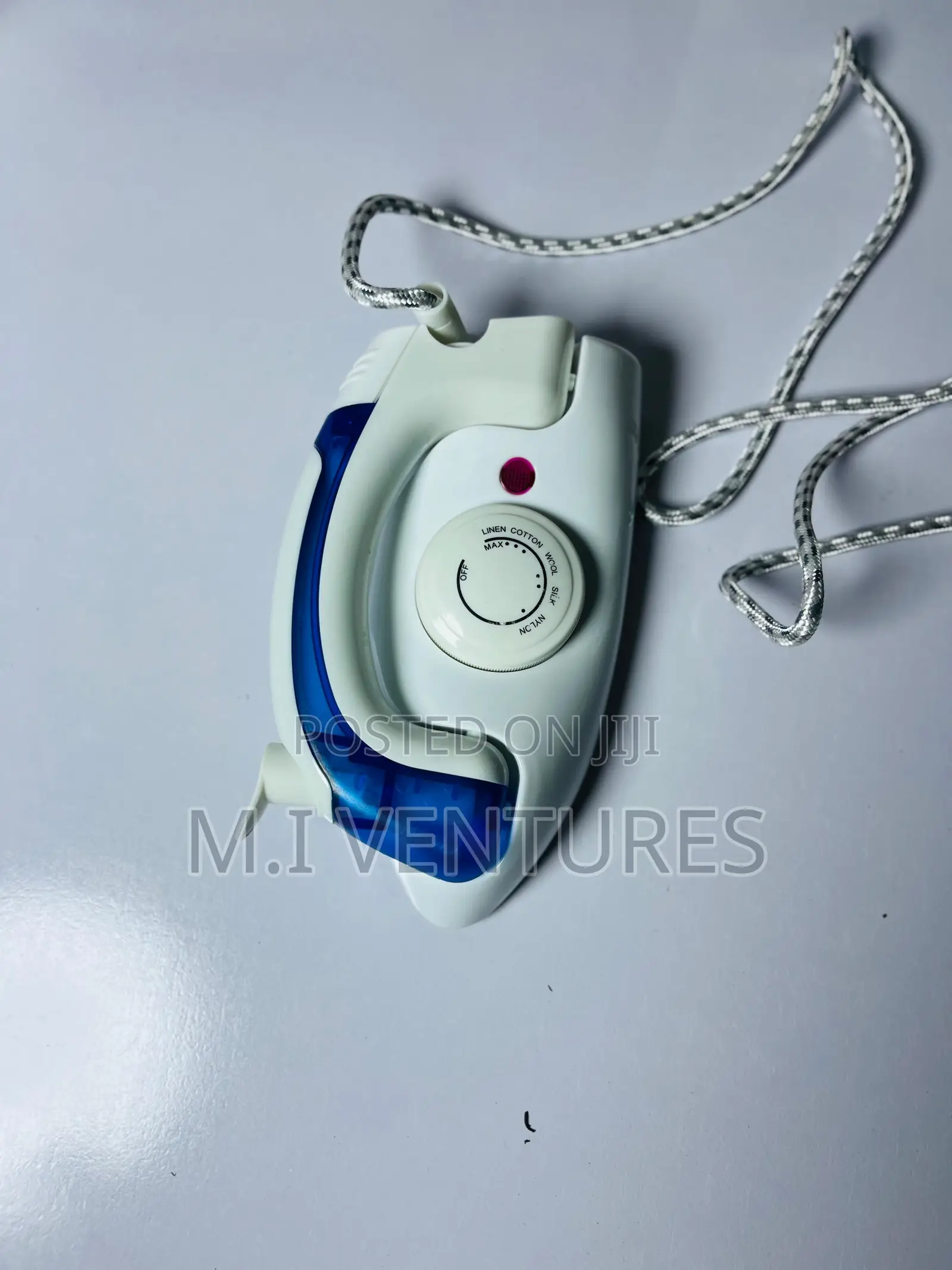 H E Portable Travel Steam Iron
