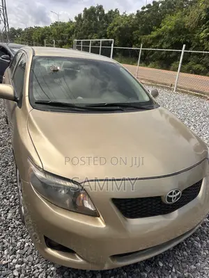 Toyota Corolla LE 4dr Sedan (1.8L 4cyl 4A) 2010 Gold