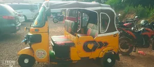 Bajaj RE 2025 Yellow