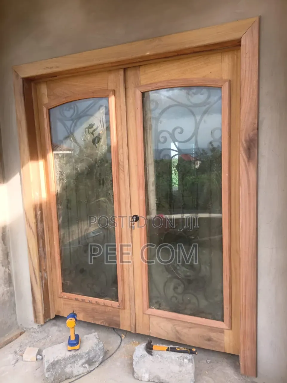 Special Wooden Door (With Metal Designing and Glass Framing )