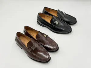 Black Leather Loafers by Holiman Feature a Polished Finish