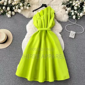 Make A Bold Entrance In Our Stunning Lime Green One Shoulder Dress.