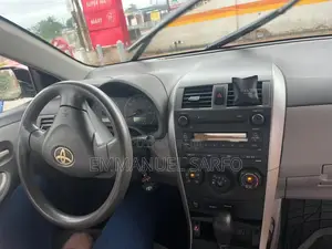Toyota Corolla Base 4dr Sedan (1.8L 4cyl 5M) 2010 Red