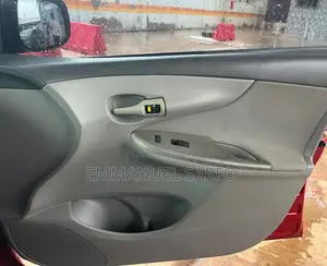 Toyota Corolla Base 4dr Sedan (1.8L 4cyl 5M) 2010 Red