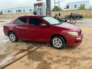 Toyota Corolla Base 4dr Sedan (1.8L 4cyl 5M) 2010 Red