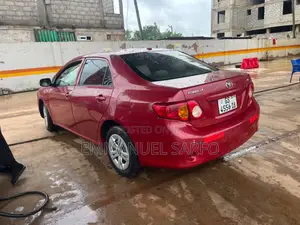 Toyota Corolla Base 4dr Sedan (1.8L 4cyl 5M) 2010 Red
