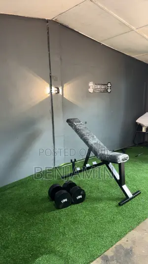 Adjustable Bench And Dumbells