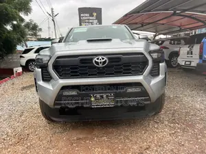 Toyota Tacoma TRD Sport Double Cab 4WD 5.0 ft. SB (Hybrid) 2025 Beige