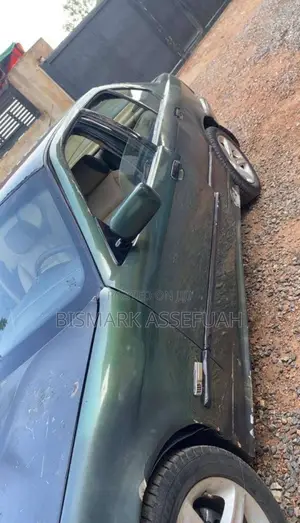 BMW 3 Series 318i RWD 1998 Green