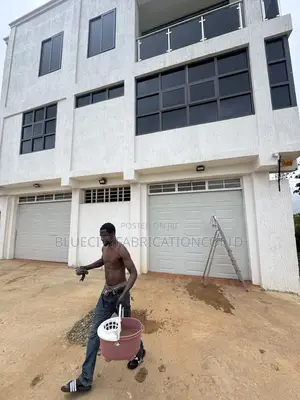 Garage Door With Extended Fanlight
