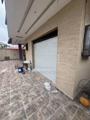 Garage Door With Extended Fanlight
