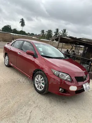 Toyota Corolla Base 4dr Sedan (1.8L 4cyl 5M) 2010 Red
