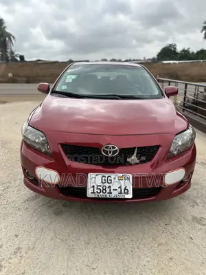 Toyota Corolla Base 4dr Sedan (1.8L 4cyl 5M) 2010 Red