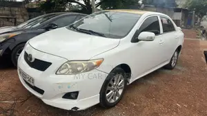 Toyota Corolla Base 4dr Sedan (1.8L 4cyl 5M) 2010 White