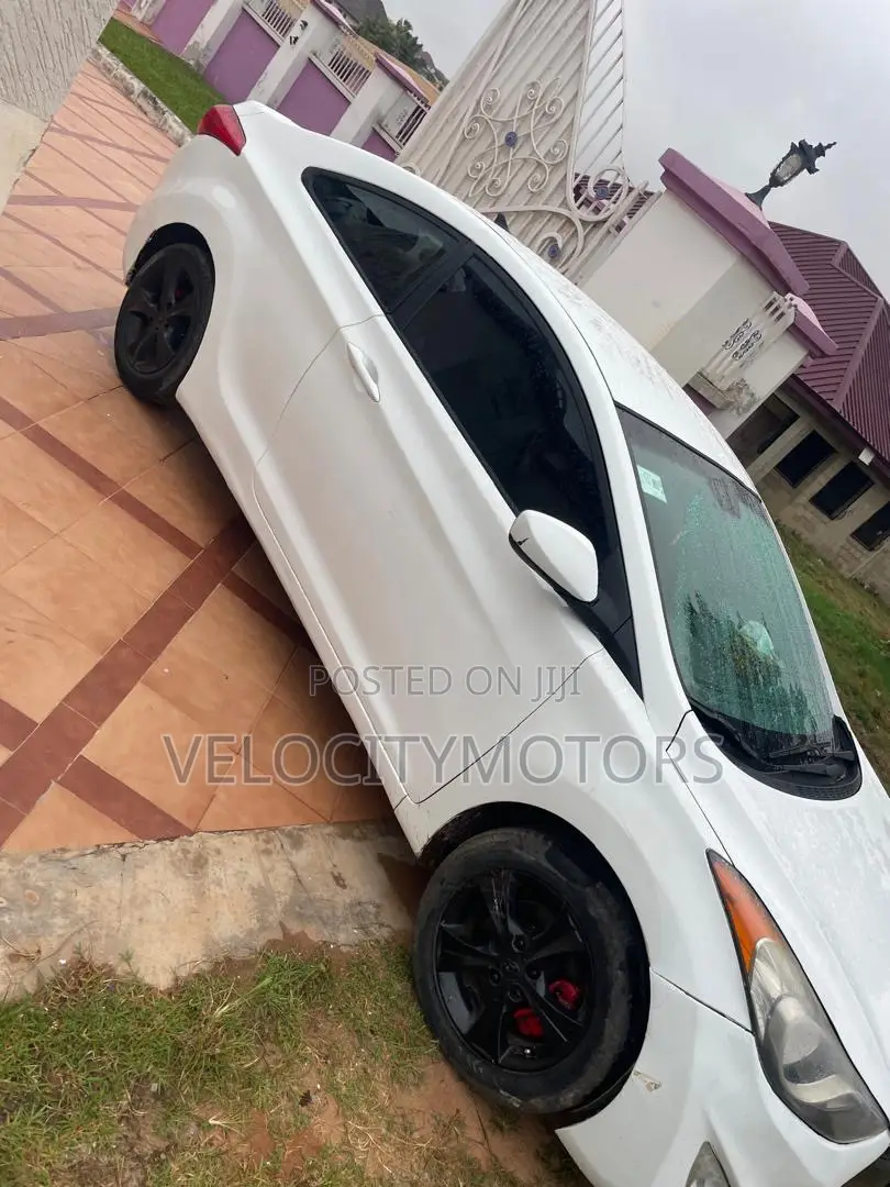 Hyundai Elantra SE Coupe FWD (1.8L 4cyl 6A) 2013 White