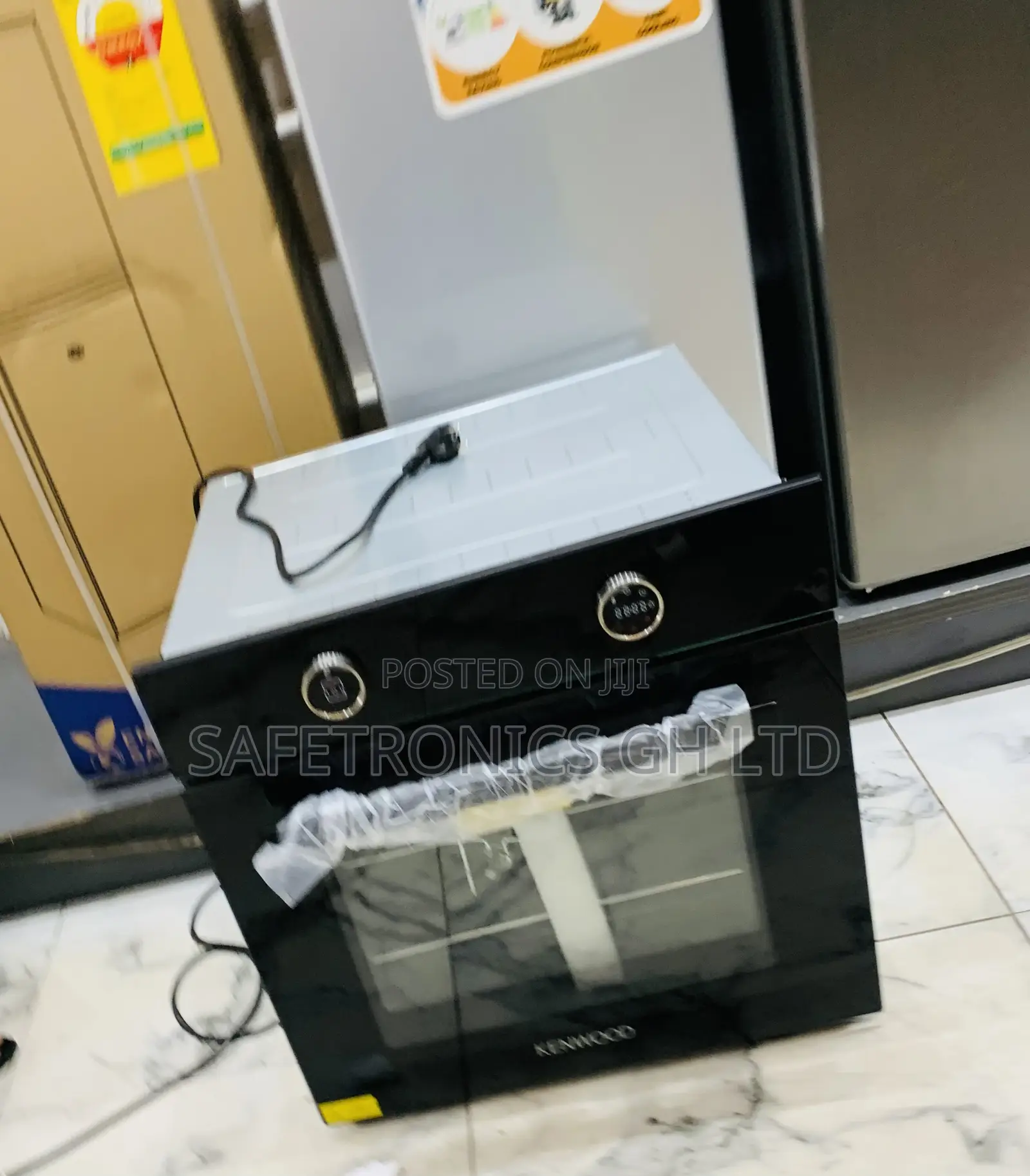 Neatly Sealed Black Sleek Kenwood Electric Ovens