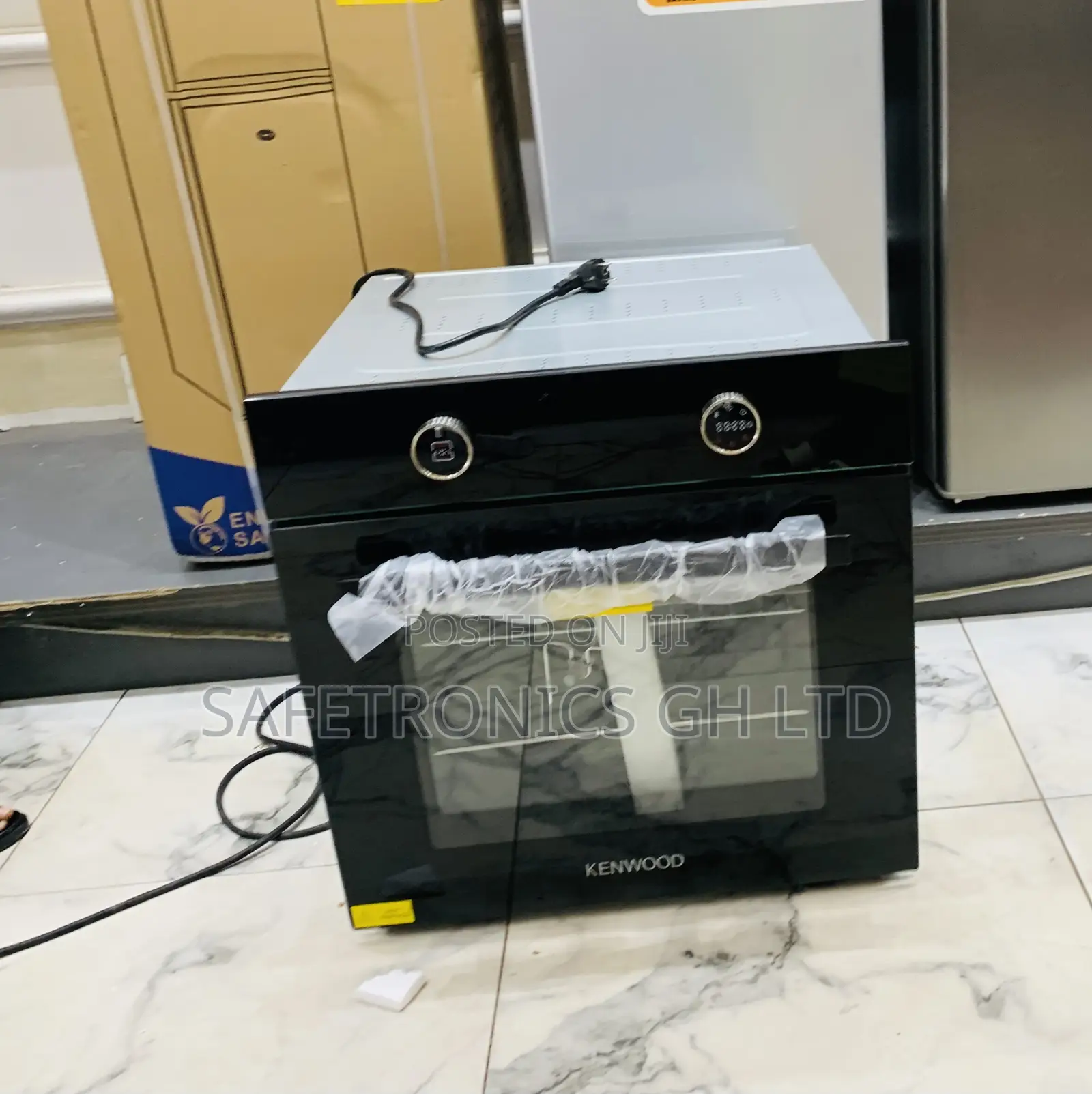 Neatly Sealed Black Sleek Kenwood Electric Ovens