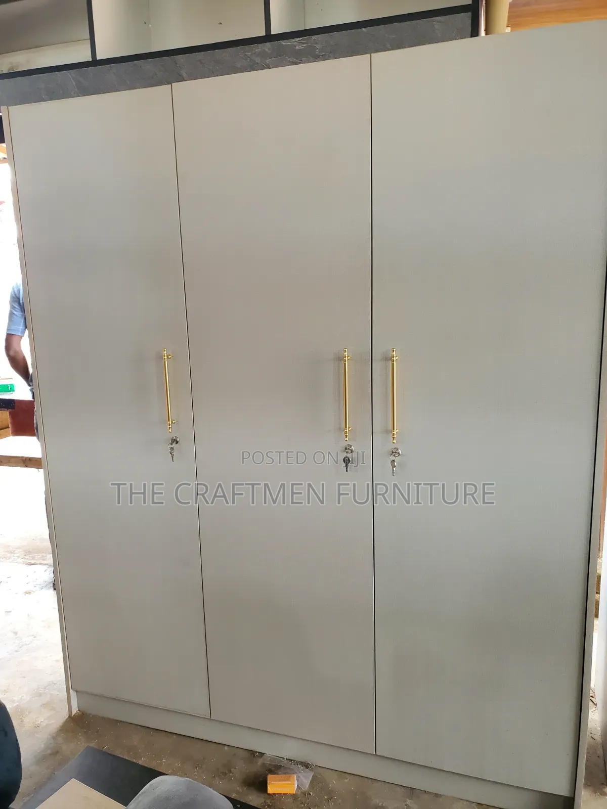 Foreign Wood Laminated 3 Doors Wardrobe.
