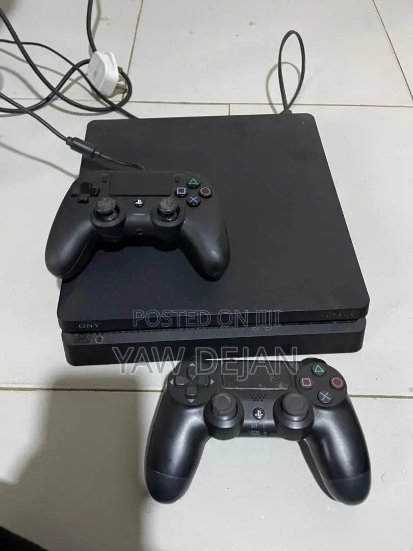PS4 Slim (1TB) With 2 Controllers and 5 Game CDS and FC26