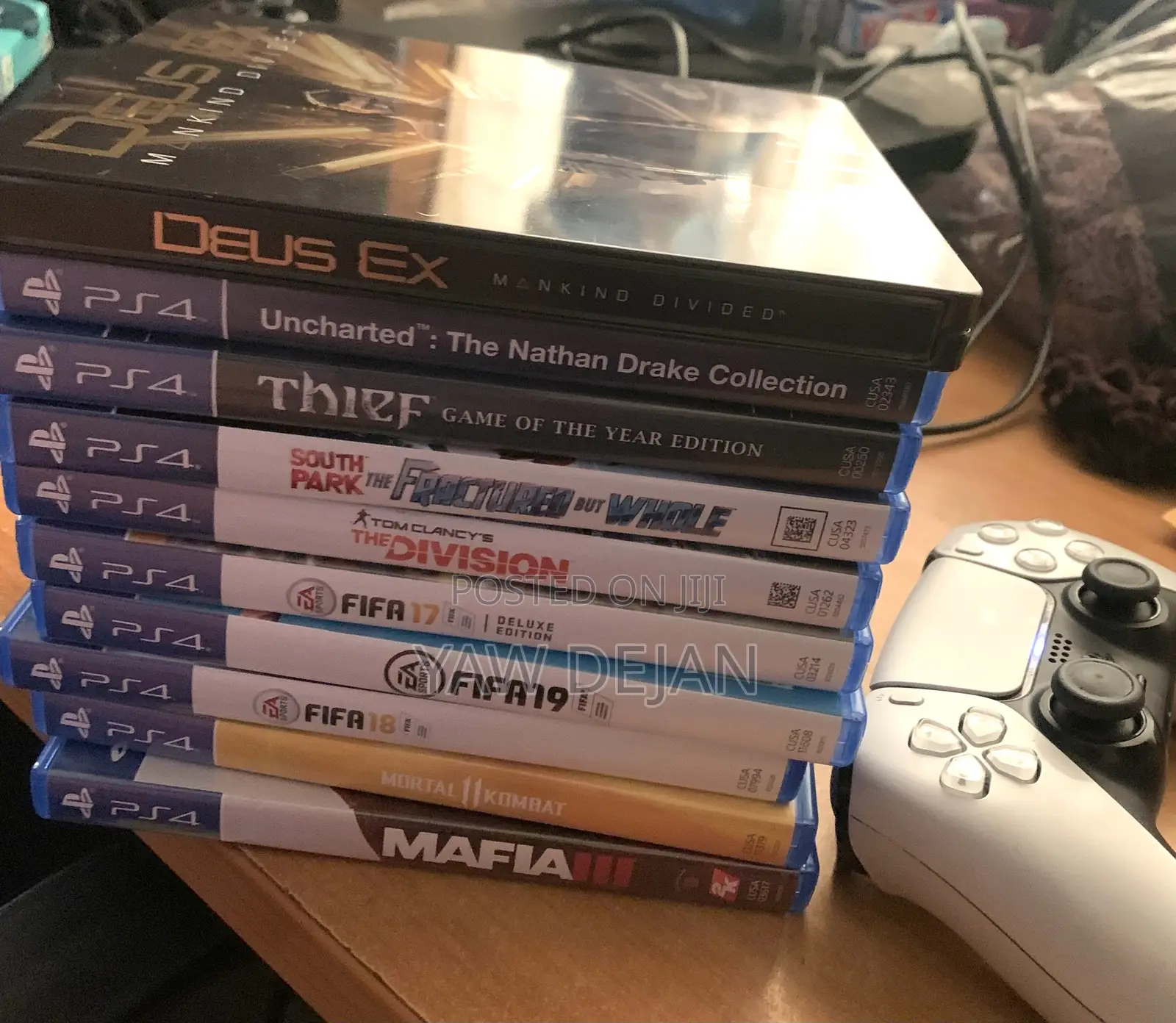 PS4 Slim (1TB) With 2 Controllers and 5 Game CDS and FC26