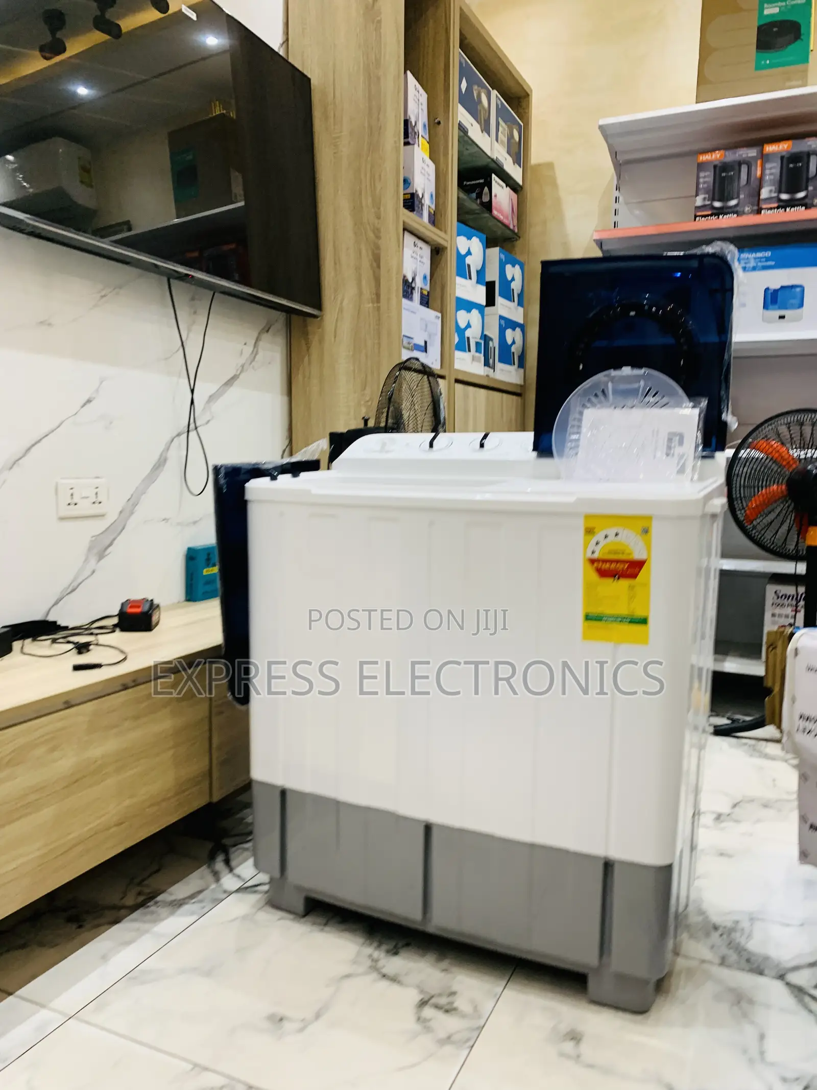 Available at 10GiG Store TCL 10.5kg Top Loading Washing Machine