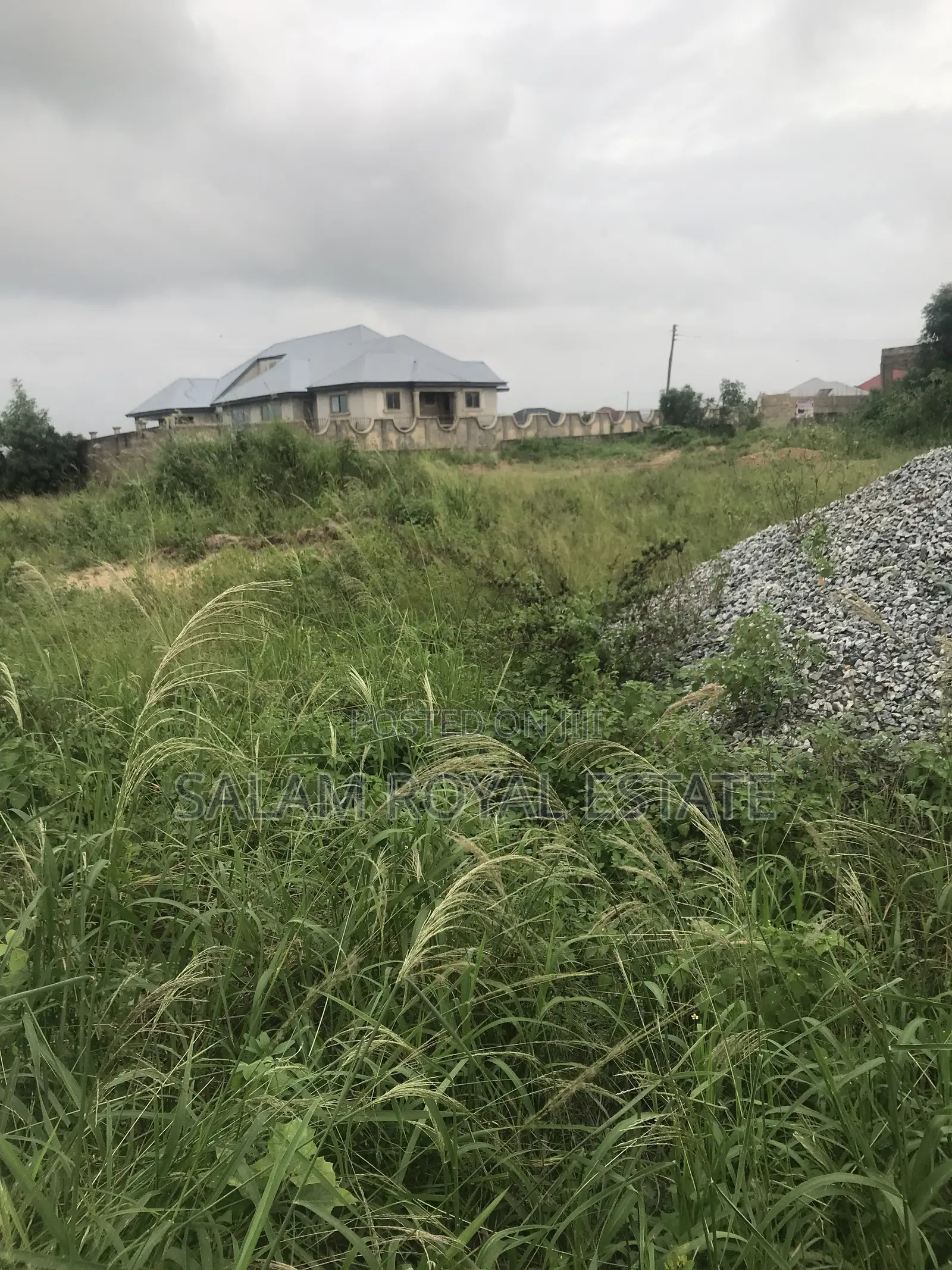 One Plot of Land With Wall at Amasaman Kasoa Road